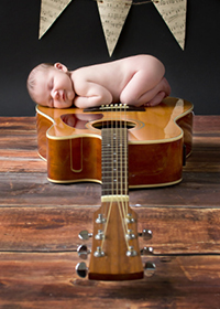 naked-baby-on-guitar.jpg